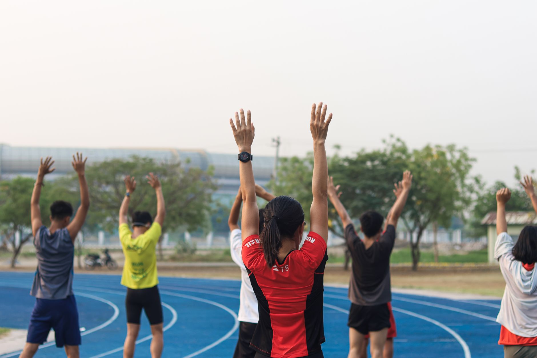 Préparation physique générale (PPG) : définition concrète et objectifs réels — groupe d'entraînement fitness en extérieur